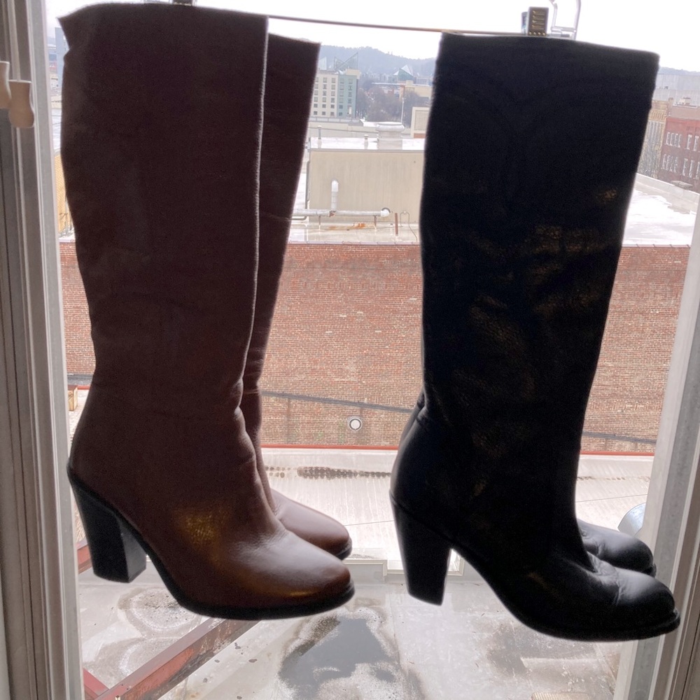 Two pair of heeled boots (black and brown).